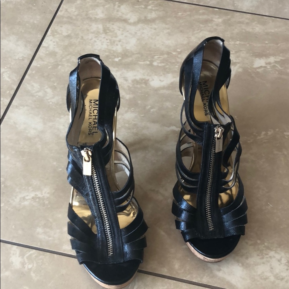 Micheal Kors black leather gold and cork sandals.
